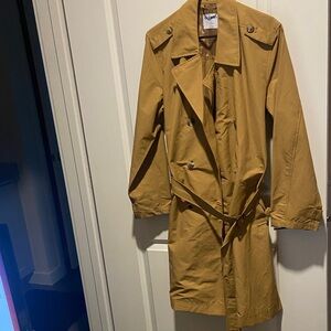 A mid-length trench coat